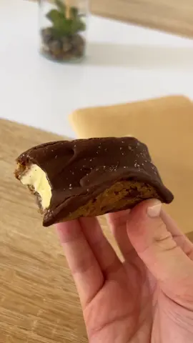 cookie choco-taco!! #cookies #chocotaco #baking #fyp #cookietaco Cookie Choco-Taco RECIPE   Ingredients:  1 3/4 cups (210g) all-purpose flour  3/4 tsp baking soda  1/2 tsp salt  1/2 cup (113g) unsalted butter, softened  3/4 cup (165g) light brown sugar  1/4 cup (50g) granulated sugar  1 large egg  2 1/2 tsp vanilla extract  1 1/2 cups (270g) semi-sweet chocolate chips, plus extra for topping  Vanilla ice cream (for filling)  1 1/2 cups (255g) semi-sweet or milk chocolate, melted (for dipping)   Instructions:  Preheat oven to 350°F (175°C). Line a baking sheet with parchment paper.  In a bowl, whisk together flour, baking soda, and salt.  In another bowl, beat butter until smooth. Add both sugars and mix until combined (about 2 minutes). Mix in egg and vanilla.  Add dry ingredients and stir until just combined. Fold in chocolate chips.  Shape the tacos: Scoop about 3 tablespoons of dough, roll into a ball, and flatten into a thin circle (about 5–6 inches wide). Place on baking sheet. Repeat with remaining dough. Bake 8–10 minutes, until golden around the edges but still soft in the center.  Form taco shape immediately:  While still warm, gently drape each cookie over a rolling pin, on the side of a loaf pan, or between two cups to create a taco shell shape. Let cool completely so they hold their form.  Fill & dip: Once cooled, fill each taco shell with vanilla ice cream. Dip the top edge in melted chocolate and place on a tray lined with parchment paper. Freeze until the chocolate sets. Serve immediately or store in the freezer until ready to eat.