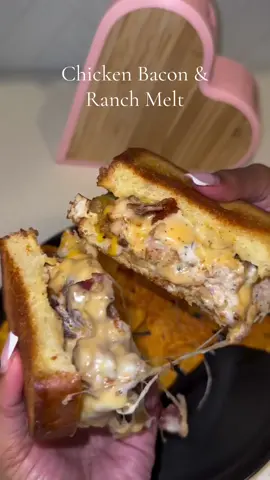 Ingredients (per sandwich) 	•	2 slices bread (Texas toast, sourdough, or your choice) 	•	2–3 slices cooked chicken breast (grilled or rotisserie) 	•	2–3 slices cooked bacon 	•	2 slices American cheese 	•	¼ cup shredded cheddar cheese 	•	2–3 tbsp ranch dressing 	•	1–2 tbsp butter (for toasting bread) ⸻ Assembly Steps 	1.	Butter the bread – Spread butter on one side of each slice. 	2.	Layer (butter sides facing out): 	•	Bread slice 	•	1 slice American cheese 	•	Chicken 	•	Bacon 	•	Drizzle ranch dressing evenly over chicken and bacon 	•	Sprinkle cheddar cheese on top 	•	1 slice American cheese 	•	Top with second bread slice 	3.	Grill/Melt – Place in a skillet or on a griddle over medium heat. 	4.	Press gently with a spatula and cook until golden brown and the cheese is fully melted (about 3–4 minutes per side). 	5.	Serve hot – Slice in half and enjoy the ooey, cheesy melt. 🎥@cookingwithdestiny_ #chicken #bacon #sandwich #cheese #FoodTok 