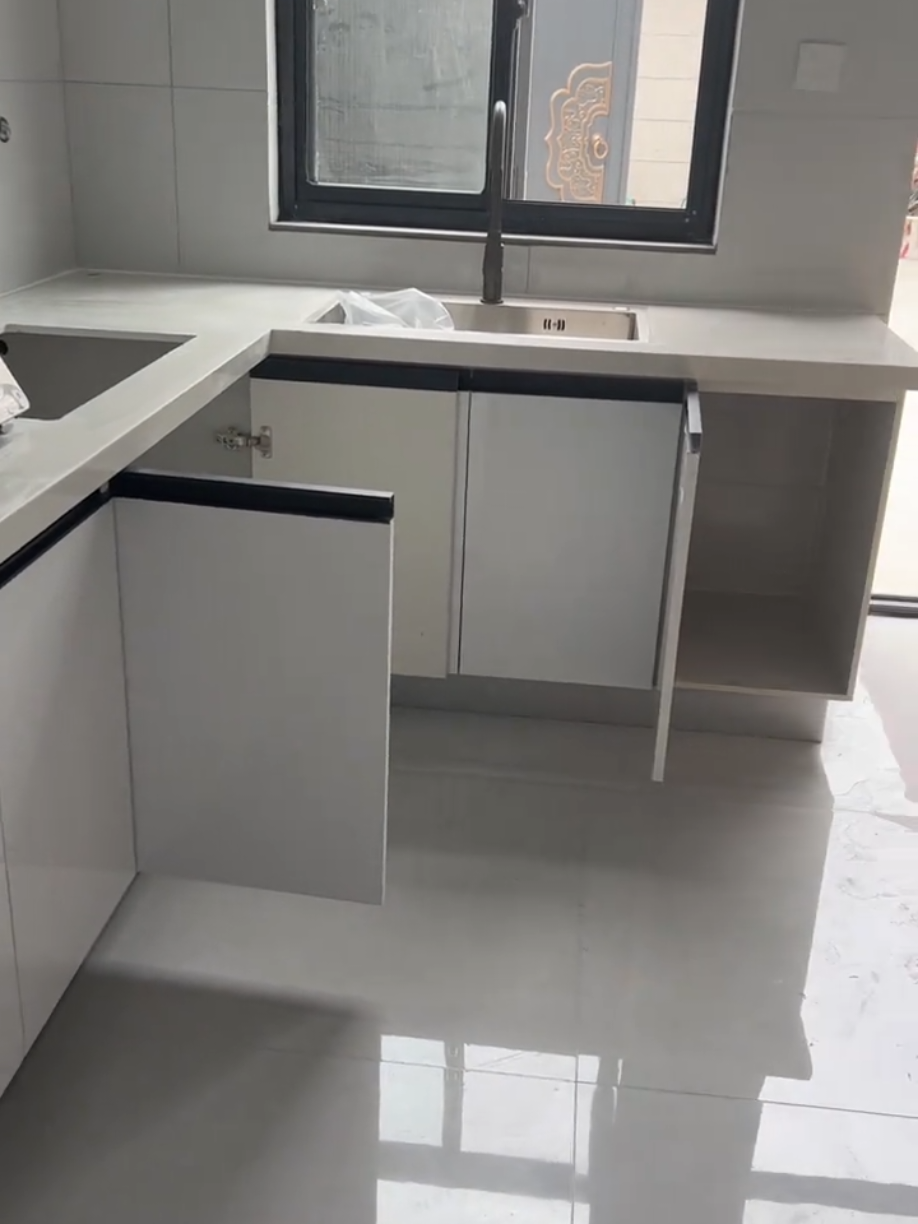 This kitchen is designed in full tiles and the floors are also designed in UPVC with screws.#foryou #foryoupage #fyp #fypシ゚ #kitchen 
