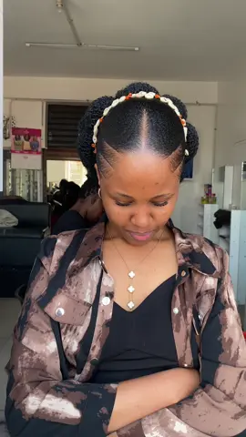 Hairstyling at Clairehairgame #clairehairgame #bridalhair #gelstyling #kenyaweddings 