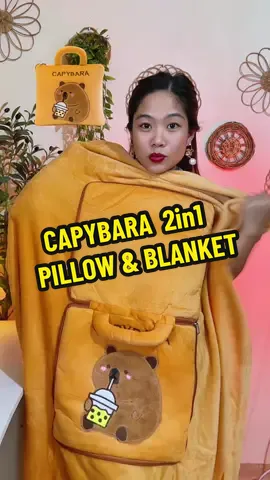 One product, two uses - less stuff to carry. Just unzip, pull it out and boom! instant blanket. #pillowblanket #2in1pillowblanket #travelessentials #capybara #capybaralover 