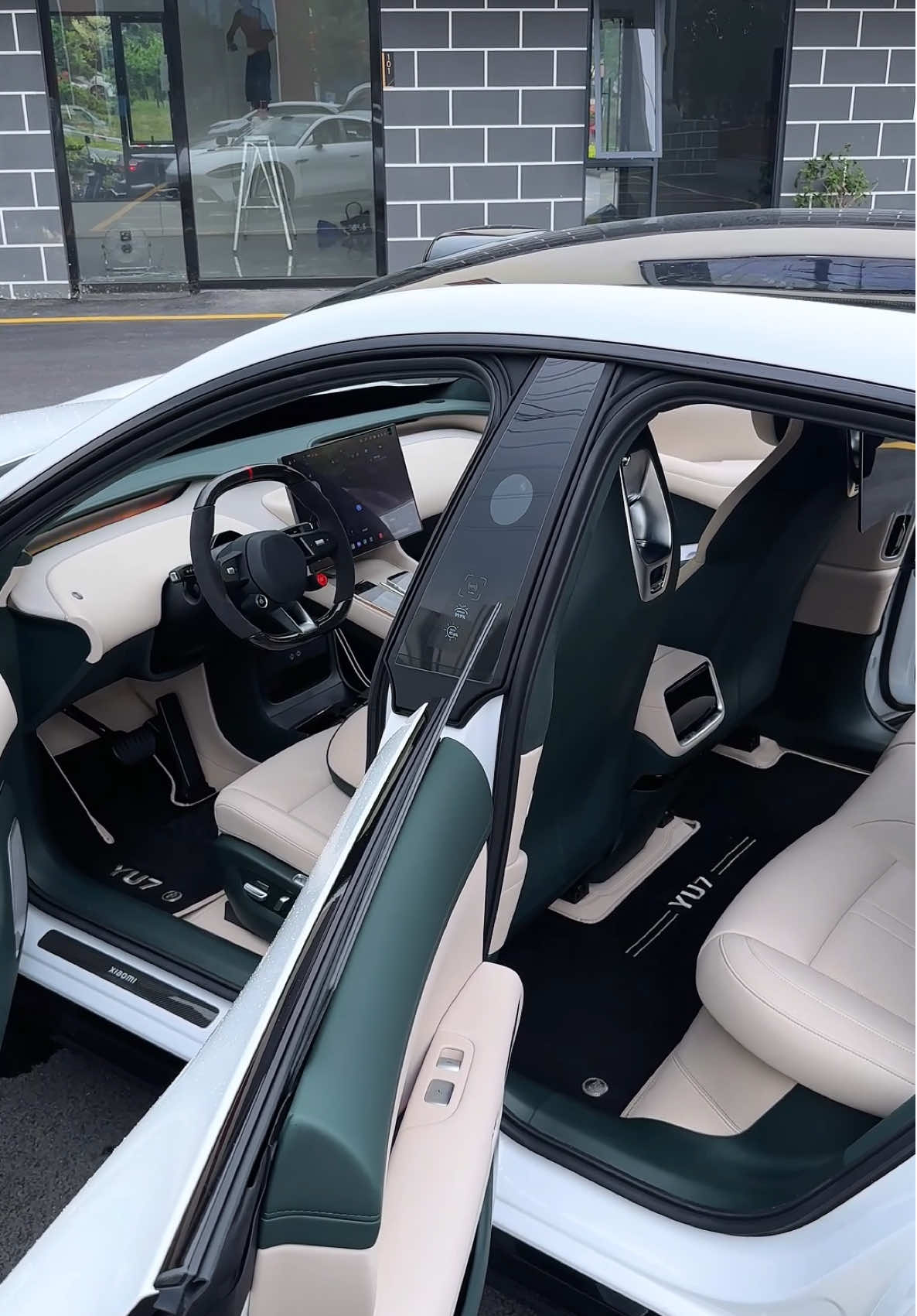 Step inside the YU7 Max White — extended leather everywhere, from dash to doors, and custom floor mats to match. This isn’t just an interior… it’s a five-star suite on wheels… with a snapdragon processor 😂. #automotive #xiaomi #yu7 #su7 