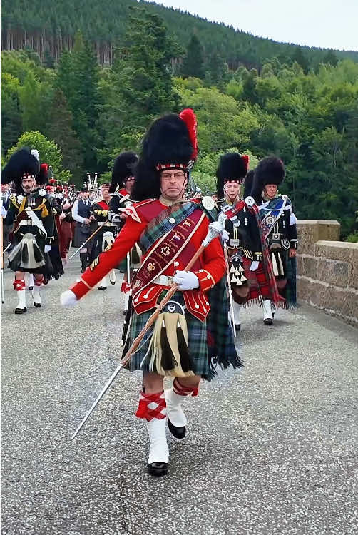 Scotland the Brave as massed Pipe Bands march over river Dee to 2024 Ballater Games in Scotland #aberdeenshirescotland #Scotland #pipe #ballater #parade 