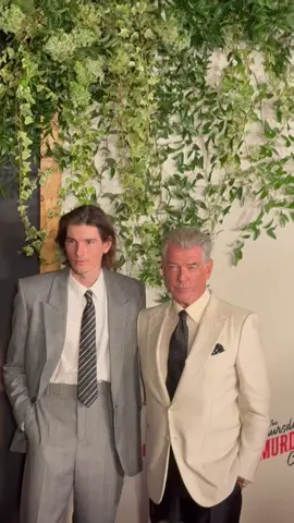 #piercebrosnan takes photos with his son dylan at the nyc premiere of #thethursdaymurderclub 