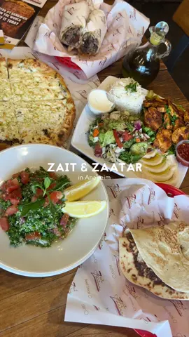 Zait & Zaatar | Anaheim, CA Fresh and Authentic Lebanese food from @Zait and Zaatar was such an awesome experience for a first timer like me 😋 I love how everything was made fresh 👏 Their Beef Shawarma wrap was delicious and quickly became one of our favorites! The wrap was soft, the sauces creamy, and there was a generous amount of meat 🤩🙌🏻 The Combo Bread with Cheese & Zaatar was so yummy and unique. The Zaatar’s seasoning really stood out, you can taste thyme, oregano, and more 😋 Their Tabbouleh was colorful and fresh 🥗 A squeeze of lemon and a drizzle of their made in house zait (oil) made it even better, especially with their bread !! We also tried the Spicy Potatoes, which had a kick that surprised me! Not too hot for my spice-loving boyfriend, but enough to tingle the tongue 😉 Freshly fried potatoes with seasoning, hot and tasty~ Lastly, the Sheesh Tawook Plate was a meal in itself with greens, rice, hummus, and chicken that paired perfectly with the hummus. We even made mini wraps with our bread. Portions were generous, perfect for sharing! Overall, Zait & Zaatar is an authentic spot worth visiting in Anaheim 🇱🇧❤️ The staff is kind, and they clearly take pride in their food 😋 Thank you again for having me !! 💌 𐙚 ⋆˚࿔ what we got: ♡ Beef Shawarma ♡ Combo Bread (Cheese & Zaatar) ♡ Tabbouleh ♡ Sheesh Tawook Plate ♡ Spicy Potatoes follow me for more cafe & foodie spots ₊˚࿔*:･ more info ‎༘⋆⟡ 🅿️ free plaza parking  ⏳10-15 min 🪑some indoor & outdoor seating ⏰ 8am-10pm Mon-Sat, 8am-9pm Sun #f#FoodTokf#fypv#viralfoodt#tastytokfoodtrend 