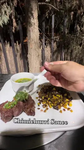 Chimichurri Sauce v Fresh, zesty, and the perfect match for a juicy steak — with a colorful side of corn, onions, and peppers Ingredients: • 1 cup chopped parsley • 3 Tbsp minced garlic • 3 Tbsp red wine vinegar • 1 tsp dried oregano • ½-1 red chili pepper, minced • 1 tsp kosher salt • ½ tsp black pepper • ¾ cup good olive oil Recipe by @mimosas_and_samosas #ChimichurriSauce #SteakLovers #FreshFlavors #MimosasAndSamosas #FoodieReels  