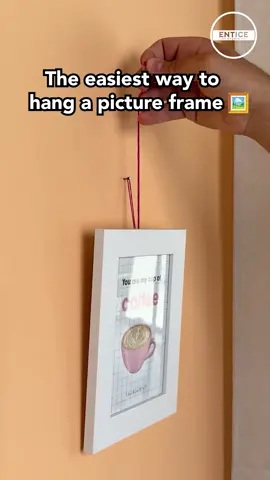 The easiest way to hang a picture frame 🖼️ #easy #picture #frame #trick 