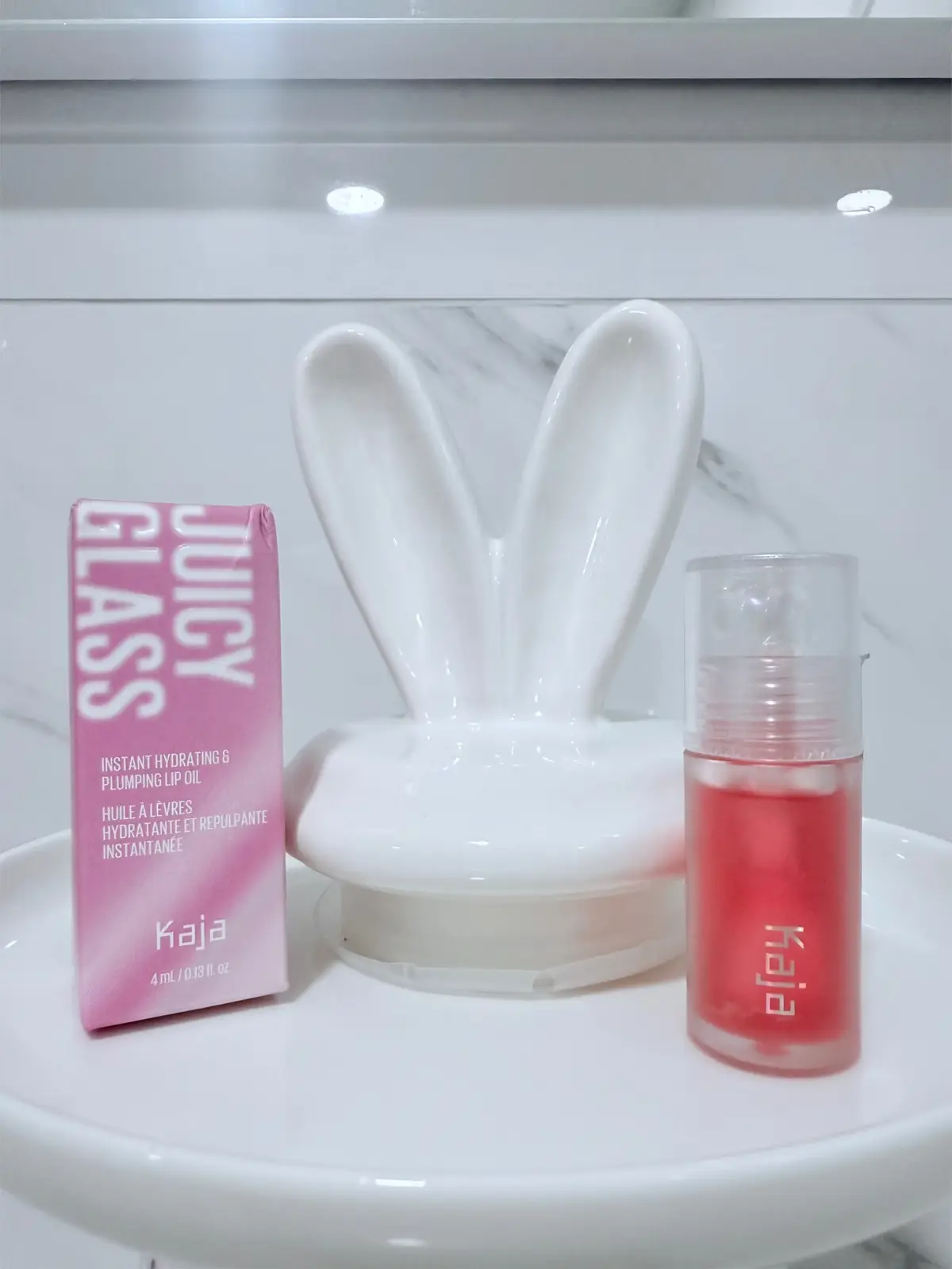 Obsessed with #kajabeauty 💖 This plumping lip oil is stunning , no pain, just a refreshing menthol tingle and yummy scent ✨ Hydrating, glowy, non-sticky, and the big applicator feels like a lip massage! 💋 Cutest packaging ever (that marble click is addictive 🤩) Thank you so much @Kaja Beauty @Skeepers for letting me enjoy these amazing goodies to test! #kajabeauty #skeepers #viralmakeup #BeautyReview  