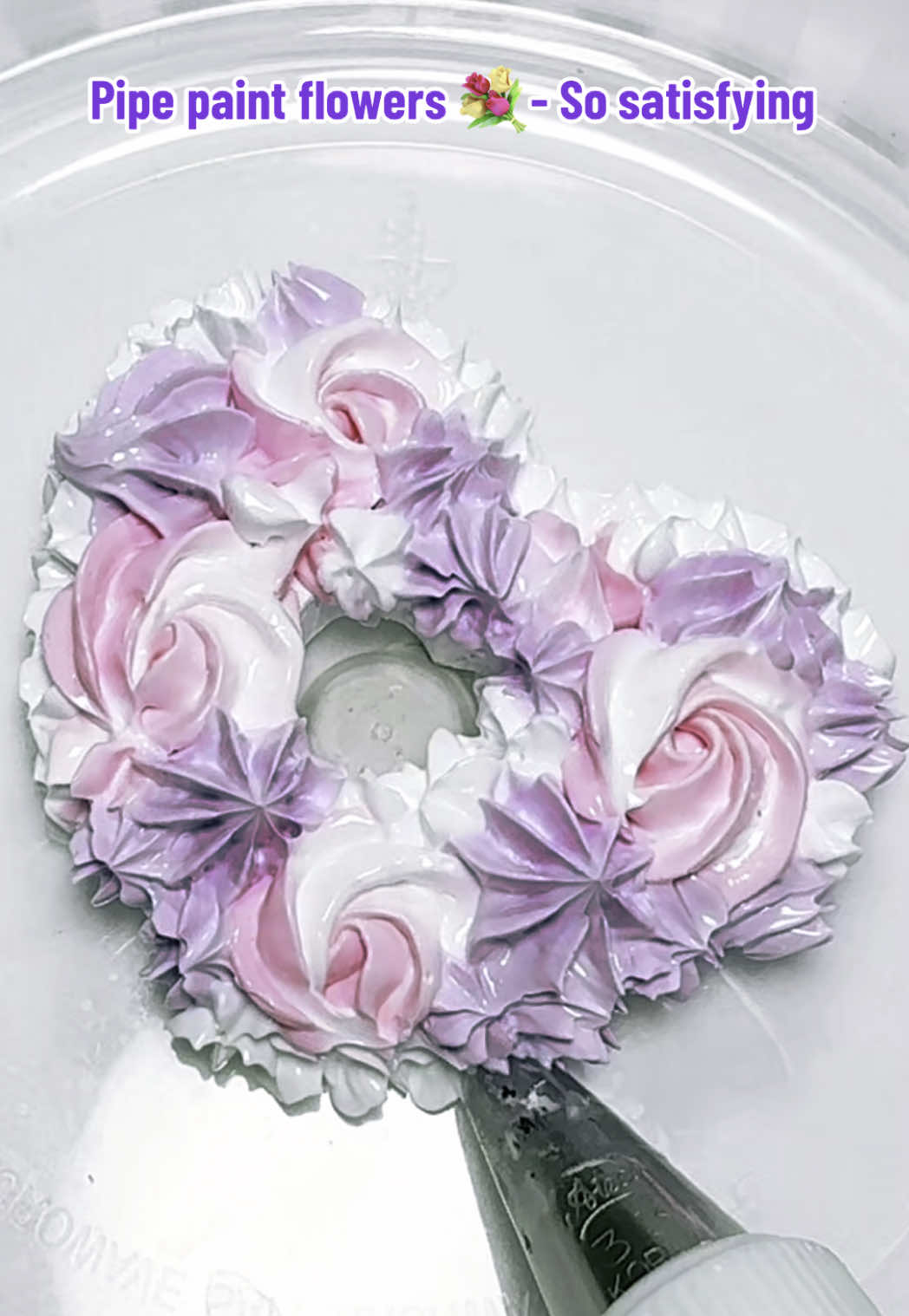 Pipe Painting flowers on a heart shaped fake bake 🎂 using Gaffrey’s heavy texture acrylic paint 🎨 #flowers #purple #white #cakeart #3dart #acrylicpainting #heartcake #gaffreyartmaterial #asmr #cakedecorating #fakebake #3dartwork #heartcake 