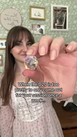 How fun is this dice necklace for all my TTRPG lovers? The glass D20 is linked in my bio!!! #ttrpg #d20 #dnd #dandd #dungeonsanddragons 
