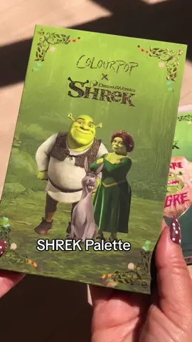 Revealed 🚨😱 NEW!! Collab NEW! 💚✨ #SHREK Collection !!! Dreamworks X #ColourPop ✨ Beware Ogre Eyeshadow Palette $24 Also includes: ✨Instant Crush Lip & Cheek Balm $12 multi-use balm, buildable, dewy finish. True Love’s From - warm pink  Fairytale Things - warn berry ✨Candy Lip Oil $10 With a roller ball applicator and colourful beads. Gumdrop Buttons - Clear, Candy flavor ✨Ultra Glossy Lip $10 Sheer high-shine gloss •Ogre - Clear opal with golden, silver and green pearl, chocolate mud pie flavor •Ogress - warm taupe, piña colada flavor  •Noble Steed - Cool pink with a silvery sheen, waffle flavor  •Short Lord - Rich berry, blueberry muffin flavor  ✨Glitterally Obsessed Body Glitter Gel $10 Ogres Are Like Onions - Peachy golden with rainbow glitter ✨ Dragon’s Keep Mascara & Eyeliner Kit $14 Fire Breath - crème gel liner, multi-chrome finish Dragon - burgundy volumizing mascara  •Collection $115  ﻿﻿•Totally Swamped $36  4 Ultra Glossy Lips ﻿﻿•Shrek-spress Yourself $32  Eyeshadow Palette & the Candy Lip Oil Will be available ➡️ August 21 @ 10am on their website *use code: TRENDMOOD 10% off / September 4 Amazon    Adorable collection!!! What’s on your list? 💚✨ XO #Trendmood #colourpopxshrek #newmakeuprelease 