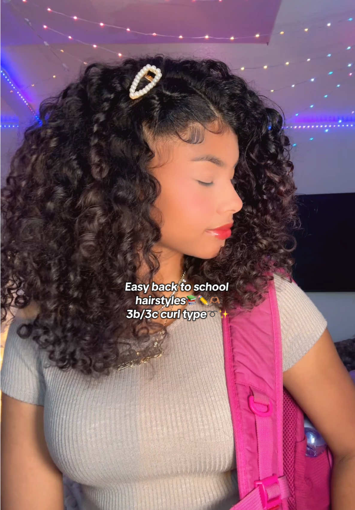 Easy back to school curly updo hairstyle to still show off the curls➰📚🫶🏽 Products used✨: @Hairitage by Mindy comb & hair oil 💖 @Eva NYC hair primer 💜 @oVertone Color revitalizer hair growth spray 🤍 Hair accessories on my @Amazon 🧡 Scent of the day @Kayali ylang Coco🥥 #backtoschool #hair #curls #curlyhair #natural  