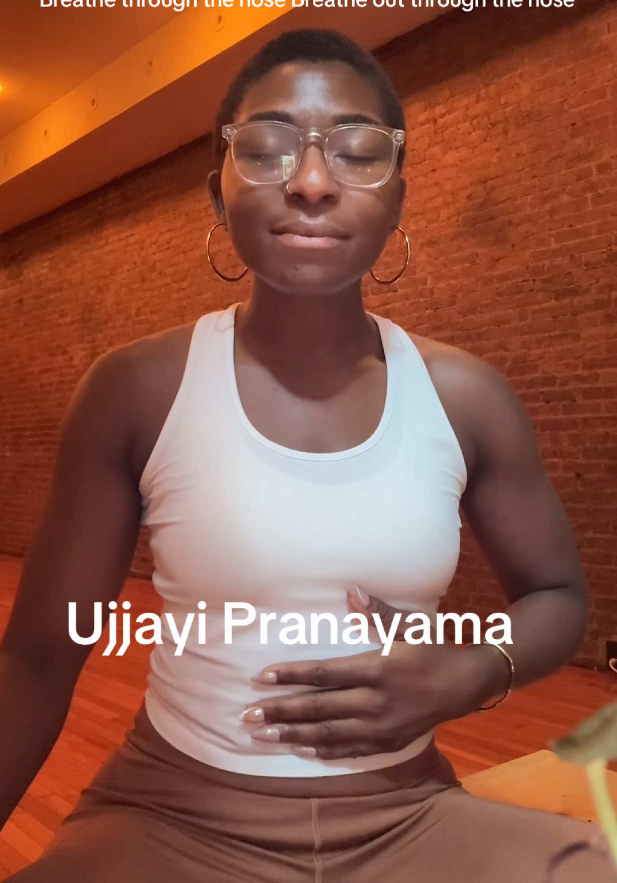 Replying to @Myra This is Ujjayi or ocean breath. Your breath is life force energy, so use it! This ocean breath keeps you calm, focused, and helps you hold poses longer. you hear your ocean? Isn’t that nice ? #blackyogateacher #pranayama #breathwork #howtobreathe #ujayibreath #StressRelief #yogaforbeginners 