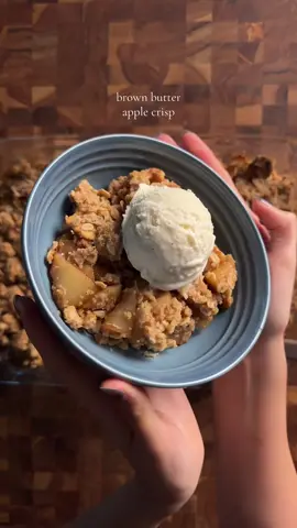 brown butter apple crisp topping: 3/4 cup (95g) flour 1/2 cup (50g) old fashioned oats 1/2 cup (100g) brown sugar 1/2 cup (60g) walnuts 1/4 tsp (1g) salt 6 tbsp (85g) butter -> brown it *brown the butter and set aside to cool a little. in a bowl, mix together the flour, oats, salt, brown sugar, and the chopped walnuts. pour the browned butter into the mixture and mix until its a crumble.  apple filling: 4-5 apples (honeycrisp or whichever you like) 1/3 cup (67g) brown sugar 2 tbsp (16g) flour 1 tsp (3g) cinnamon 1/4 tsp (0.5g) allspice (optional) 1/4 tsp (1g) salt *peel and slice the apples into either cubes or slices. add in the brown sugar, flour, cinnamon, and spices. mix well. add apple mixture into a baking dish (i used a 9x5) and evenly spread on the topping. bake at 350 for 55-60 min or until the top is golden brown. recipe ib: acozykitchen #apple #applecrisp #baking #Recipe 