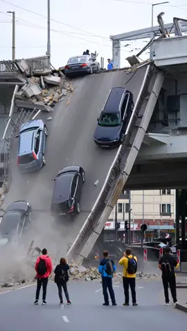 A city bridge suddenly started to collapse, taking a parked car down with it. Luckily, no one was inside — no injuries reported. But the footage looks straight out of an action movie #crash #ai #news #wow #cars        