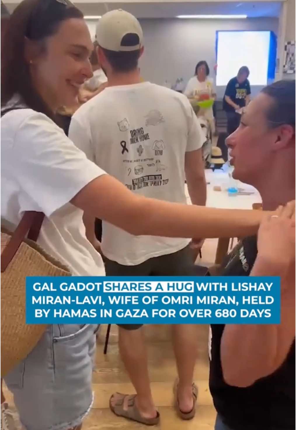 Israeli actress Gal Gadot visited Hostage Square in Tel Aviv, Israel to stand in solidarity with the families of the 50 hostages still held by Hamas in Gaza. Here she is seen talking with Lishay Miran-Lavi, wife of Omri Miran, who has been held hostage in Gaza for over 680 days. They must all be released NOW! 🎗️