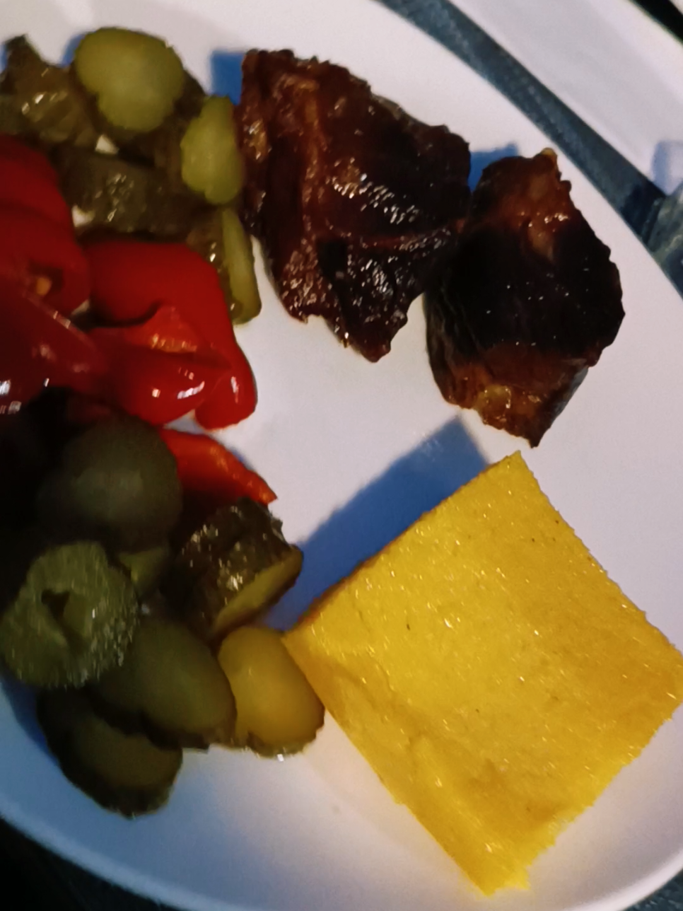 🇷🇴 Pork meat cooked slow (Romanian: Carne la Gârniță) with pickles and polenta. A delicious Romanian traditional food that is a must to try if you visit Romania. We tried this amazing food at the Domniței Hotel restaurant and it was delicious.  #romanianfood #hoteldomnitei #domniteihotel #restaurant #romania  @Romania @Hotelul Domniței @C. N. I. P. T. Vâlcea @Discovervâlceacounty 