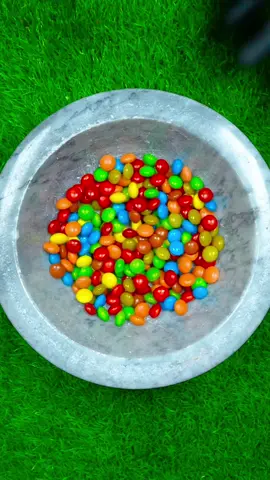 Crushing M&Ms into chocolate 🍫😱 #oddlysatisfying #asmr #fyp