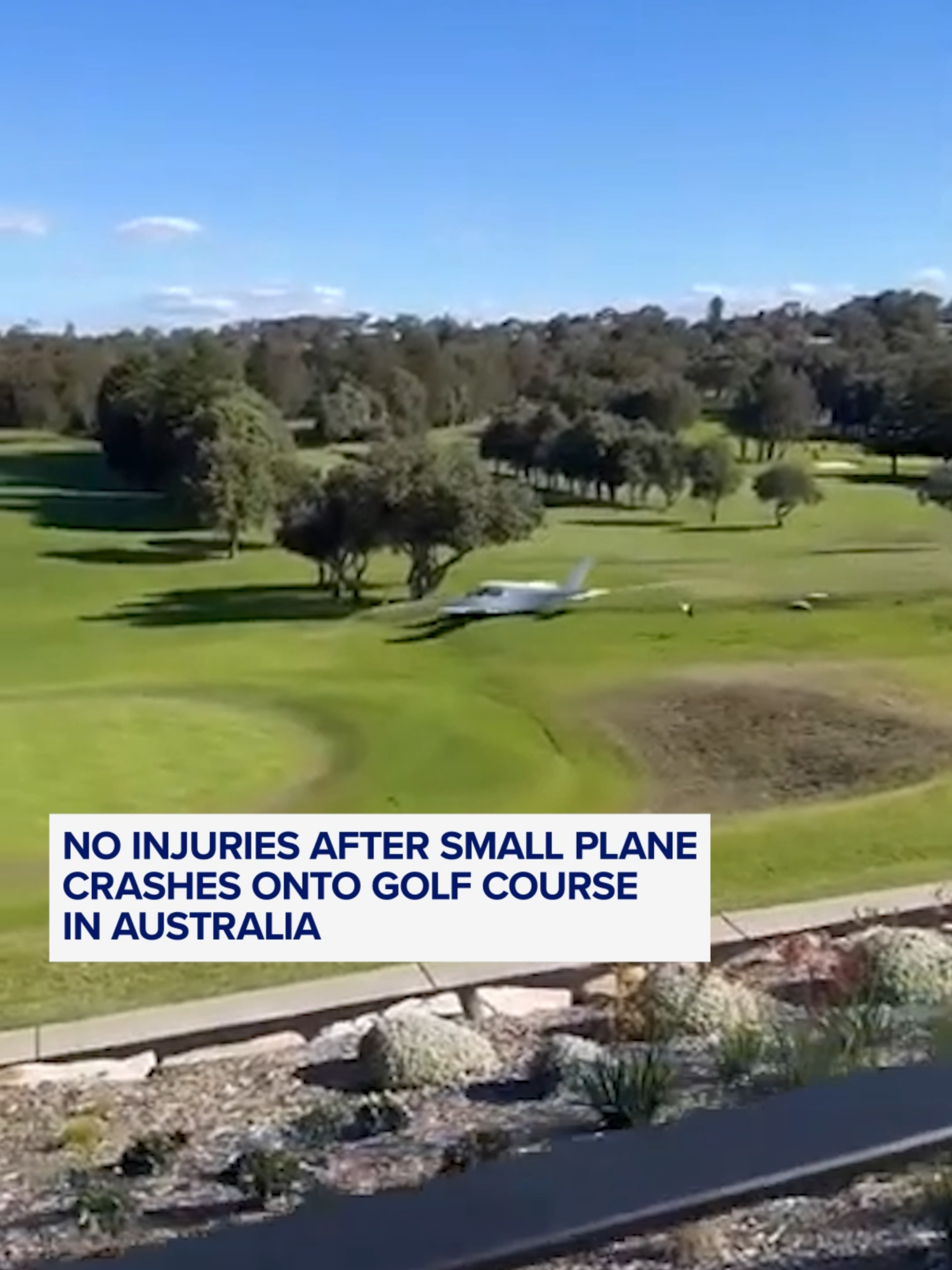 An eyewitness captured the dramatic moment a small plane crash-landed onto a golf course in Sydney, Australia, after it lost power. Both people aboard the plane escaped without serious injury, and no bystanders were hurt, officials said. #news #abcnews #australia #planecrash