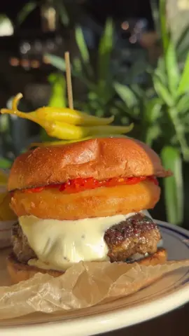 Let’s eat at one of my favorite restaurants in the city @lenadetroit  We tried their NEW Leña burger topped with a crispy onion ring, pepper relish, housemade cheese sauce and aioli on the bottom. This will definitely become one of Detroit’s best burgers.  #brushpark #brushparkdetroit #detroit #burger #downtowndetroit