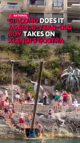 Giacomo Gatt, the young Gozitan boy whose daring attempt at the traditional ġostra went viral two years ago, has taken on the challenge once more. On a non-greased pole, he made it all the way to the edge of the wooden beam, a promising warm-up for the official ġostra held in Xlendi yesterday during the feast of Our Lady of Mount Carmel. The moment was captured by his proud father, Xlendi locals delighted to share a special family moment with the Maltese public. Giacomo’s original attempt back in 2023 drew global attention, garnering over 24 million views. Have you ever attempted this challenge?