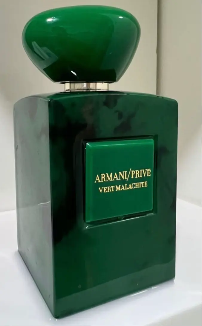🌟Armani/Prive Vert Malachite🌟 Created by Fabrice Pellegrin and released in 2016, this fragrance begins with the luminous clarity of orange, kissed by the green-woody subtlety of petitgrain. The opening is fresh, bright, and invigorating, yet it avoids the harsh or syrupy qualities that can make citrus feel juvenile. The orange unfolds like sunlight spilling through the leaves of a quiet orchard, warm but delicate, while petitgrain weaves a green, slightly bitter thread that balances the sweetness and adds a refined, almost herbal lift. It is a freshness that feels organic, natural, and perfectly measured — the kind of brightness that awakens the senses without startling them, inviting the wearer to lean into a day that promises sophistication and subtle allure. As the initial citrus radiance softens, the fragrance transitions seamlessly into a heart that is lush, floral, and quietly intoxicating. Jasmine sambac absolute emerges first, a honeyed, radiant bloom with a narcotic intensity that draws the senses inward. Its aroma feels like petals bathed in morning dew, layered with a soft, almost creamy richness that exudes sensuality without overwhelming. Ylang-ylang follows, weaving through the jasmine with an exotic, creamy-spiced warmth that deepens the floral core, enriching it with an elegance that feels luxurious yet approachable. The heart of the fragrance is golden, intimate, and multidimensional — a private garden in full bloom, where the interplay of flowers creates a natural, radiant allure. It is a transition that mirrors movement from bright daylight into an intimate, sun-drenched sanctuary, where each note unfolds with grace and deliberate subtlety. As the hours pass, the composition settles into a base that is warm, comforting, and enduring. White lily lingers with understated sophistication, a clean floral note that smooths the transition from the radiant heart to a deeper, more grounded final impression. Vanilla emerges softly, velvety and enveloping, adding a gentle sweetness that is never cloying, wrapping the wearer in a sense of warmth and quiet luxury. Benzoin anchors the base with resinous depth, a balsamic ambered glow that enhances longevity and leaves a comforting hum on the skin. The dry-down is intimate, sensual, and quietly powerful, evolving over time to leave a memorable trail that feels sophisticated rather than ostentatious. Projection begins moderate to strong, allowing the fragrance to announce itself gently in the first hour, then gracefully softens into an elegant, intimate sillage that invites those nearby to notice without overwhelming. Longevity is impressive, stretching across 7–9 hours, offering a full experience from the sparkling, green-citrus top through the luminous floral heart to the warm, resinous base. Each stage of the scent reveals itself with deliberation, like a narrative that unfolds in chapters, rewarding patience and attention with subtle complexity and depth. Wearing this fragrance feels like inhabiting a world where refinement and intimacy coexist. It evokes a sense of movement through time and light: the invigorating freshness of early morning, the sunlit radiance of midday florals, and the quiet warmth of evening shadows. The combination of citrus, floral, and resinous notes is carefully orchestrated to balance vibrancy with sophistication, sensuality with discretion, and brightness with warmth. It is a scent that does not demand attention but earns it, lingering in memory like a faint but unforgettable echo — a fragrance for those who appreciate nuance, evolution, and elegance in every stage of its wear. #PerfumeReview #FragranceLovers #LuxuryPerfume #DesignerScents #FabricePellegrin #2016Fragrance #ScentOfTheDay #PerfumeAddict #FragranceCommunity #UnforgettableScents #Whiffline #PerfumeCollection #MenFragrance #WomenFragrance #LongLastingPerfume #ScentJourney #FloralCitrusPerfume #LuxuryForLess #PerfumeObsessed #DailyFragrance #PerfumeTok #FragranceReview #fyp 
