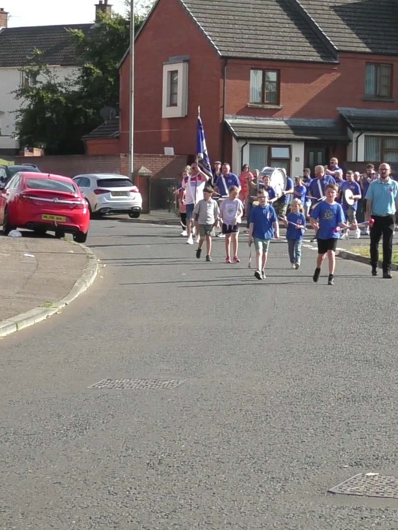 Steeple Defenders Flute Band on parade round the Rathcoole Estate on Saturday 16th August 2025 for Cloughfern Young Conquerors Flute Band Annual Parade