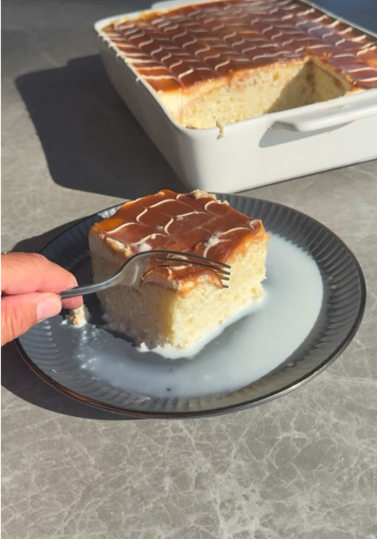 Tres Leche cake  One box of white cake mix  4 eggs 1 cup milk  1/2 cup melted butter Preheat your oven at 350° In a bowl, crack the eggs and scrambled them, then adding the milk and the butter mix that all together finally adding in the vanilla cake,  mix for about two minutes once it’s ready go ahead and pour it 9x13 pan that’s been sprayed with nonstick cooking spray. Place sit in the oven for 25 to 35 minutes. Let it cool out when it comes out of the oven for an hour Poke some holes into it and pour the milk on top. Wait until it soaks up all the milk and then add more of this milk on top, spread the frosting, then put the caramel on top, putting some frosting into a Ziploc bag cutting a little hole make some lines and then decide the top put it in the fridge for another hour and enjoy.  1/2 can condensed milk 1 cup milk 1/2 cup heavy whipping cream Mixed is in a bowl and put it on the side. Frosting 2 cups of heavy whipping cream 1 cup powder sugar  2 teaspoon vanilla  Mix these either in the kitchen stand mixer or hand mixer for Few minute or until it’s stiff peaks. Caramel sauce  1 cup sugar 1/4 cup water 3 tablespoon butter  1/4 cup heavy whipping cream  In a saucepan, add in the sugar and the water mix it around into the sugar dissolves then put it on the stove at a medium heat for about 7 to 8 minutes or until the sugar starts to brown then add in the butter and mix it until it’s smooth. Turn off the fire. Add in the heavy whipping cream. Mix it around evenly and set aside to cool down.      #fyp #fypシ #Recipe #EasyRecipe #cake      