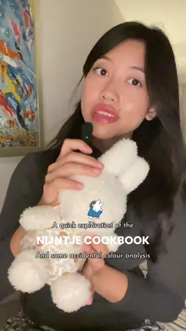 Actual exploration here: So this was just a goofy video because I thought it looked like a #coloranalysis trial, but in any case, this was a really interesting cookbook! Other than being super cute and showcasing a lot of the Dick Bruna illustrations and teaching kids where their food came from, it was curious how they integrated the concept of Nijntje and her animal friends by keeping the majority of the recipes vegetarian.  Even the depiction of the fish was of it sleeping and any mentions of other animals, like cows and chickens, focused on their products like milk and eggs. Though it would be challenging, I’d like to see how they would tackle introducing the eating of animals to children through such a book though it’s completely understandable why the topic was not really explored. I’d love to look into other children TA cookbooks to see how they introduce the concept of meat eating too. In any case, the recipes are pretty good and I’ve tried a couple of them, like the pasta frittata.  #miffy #nijntje #cookbook #nederlands 