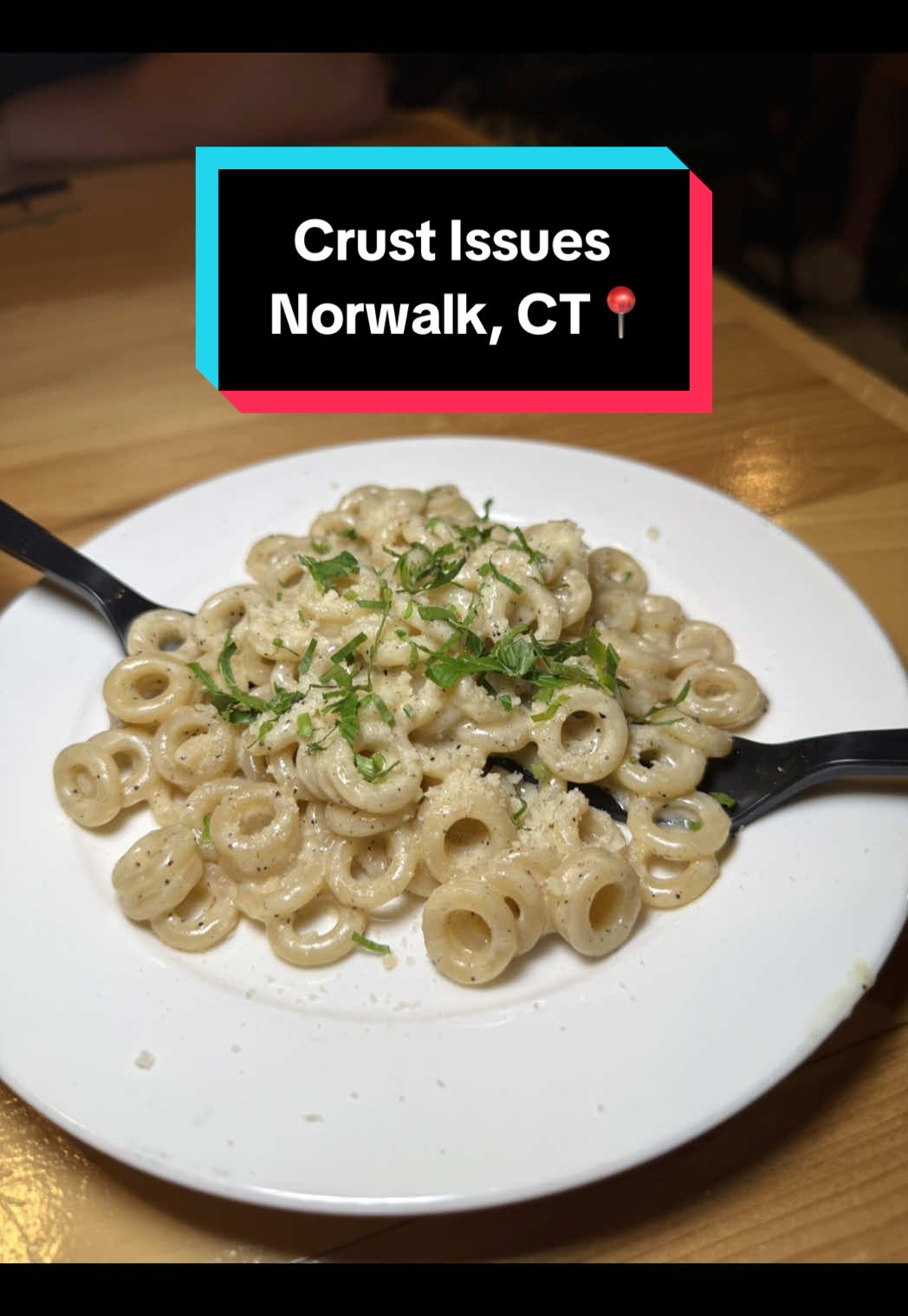 Girl I was craving some pizza and decided to check out Crust Issues (Norwalk, CT📍) and this place was phenomenal❤️‍🔥 This place 90% of the time is a normal pizzeria and the other 10% they turn into this incredible pizzeria supper club where you can indulge in a 7 course meal for only $40! The menu rotates weekly and is filled with pizzeria m dishes along with some other creative and fun dishes🤝 For our 7 course meal, we indulged in a meat lovers pizza slice (with a house salad that was SO GOOD!) that had the perfect crunch! Our big backs also enjoyed some saucy and a bit spicy alla brasa chicken wings, the most creamiest and dreamiest roasted red pepper pastina, and a creative spin on street corn, korean street corn, honey hot pepperoni chicken and the best macaroni salad i’ve ever had while watching a movie and enjoying unlimited drinks🙌 And we can’t forget about dessert💅🏼 we ate up this huge slice of this INCREDIBLE blackberry tres leches…even though I was full, I could not put my fork down🤭 This such an amazing experience and the team at Crust Issues are seriously genius for creating this supper club, all while still offering their regular menu for take out! You will not be disappointed in this 7 course meal, make sure to book your reservation in advance but space is limited girl!  #crustissues #pizzeria #supperclub #italianfood #connecticut 