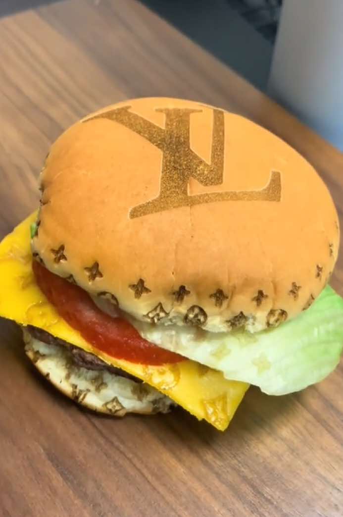 The first of it's kind Louis Vuitton cheese burger! #burger #louisvuitton #designer #food 