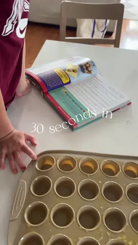 Banana chocolate chip mini muffins were a hit! Even if most of the chocolate chips were gone before they even made it into the oven 😂🍌 #minimuffins #bakingwithkids #kidscookbook 