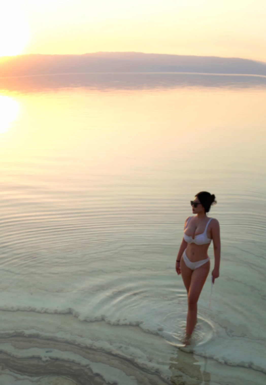 Golden hour in the ocean. 🌅 Nothing beats this view. #sunsetswim #sea #goldenhour #Summer #ocean