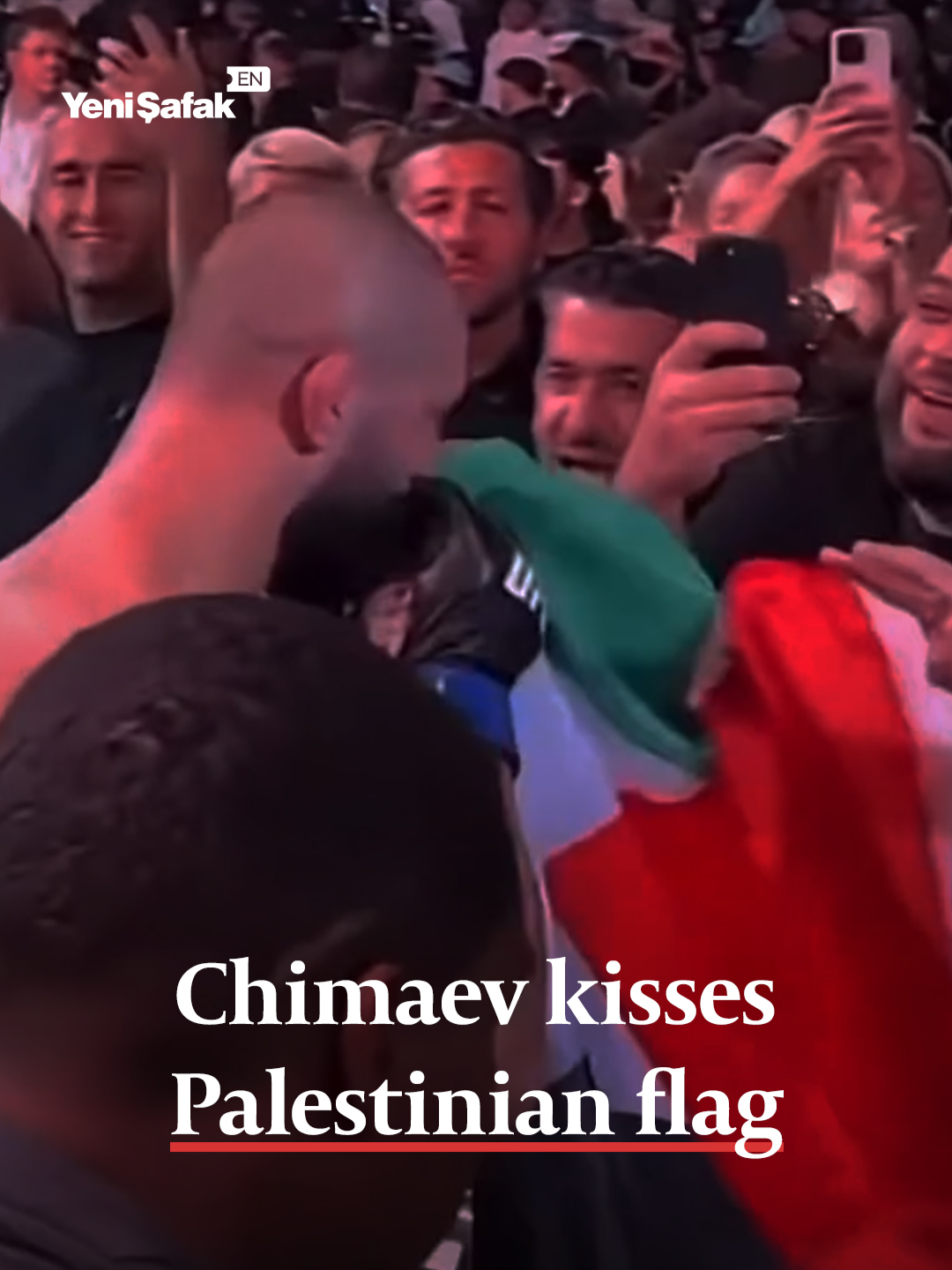 Following a commanding win in the octagon, newly crowned UFC middleweight champion Khamzat Chimaev was seen kissing a Palestinian flag handed to him by a supporter.