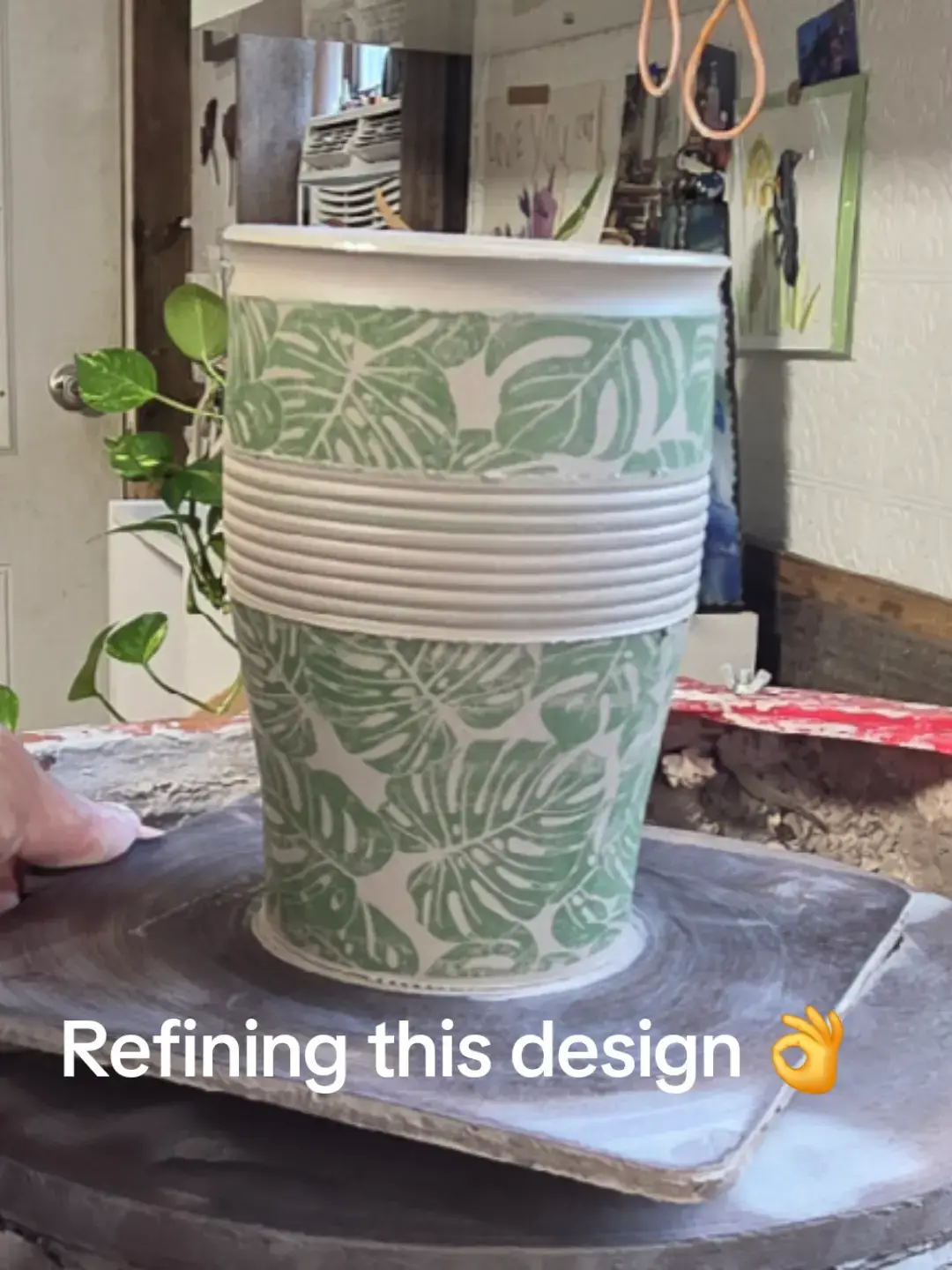 I've worked a lot this past week to refine this design. I want a travel mug that will hold some ounces of course...but also not slip out of your hands. I'm really considering leaving the ridges unglazed too in order to help with grip...what do yall think? 🤔 #travelmug #coffeeismylovelanguage #functionalart #veteranartist #wheelthrownceramics 