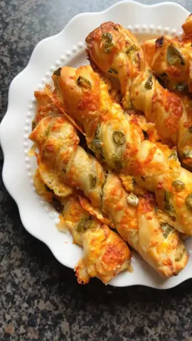 Jalapeño & Cream Cheese Cheddar twists 🌶️ 🧀                                            No exact measurements- just use as much or as little as your heart desires  #FoodTok #fyp #quickrecipes #snack #cheese 