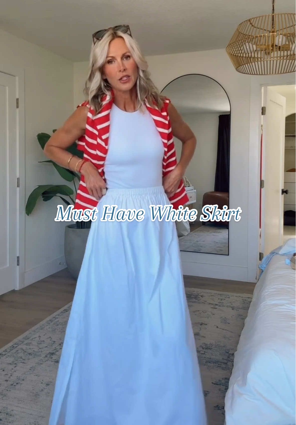 White-on-white with a pop of red ❤️ My Anna Maria Island ‘casual but still cute’ uniform. Skirt’s a must-have (XS) + half this look is Amazon! #MomsofTikTok #outfitinspo #momsover40 #vacationmode 