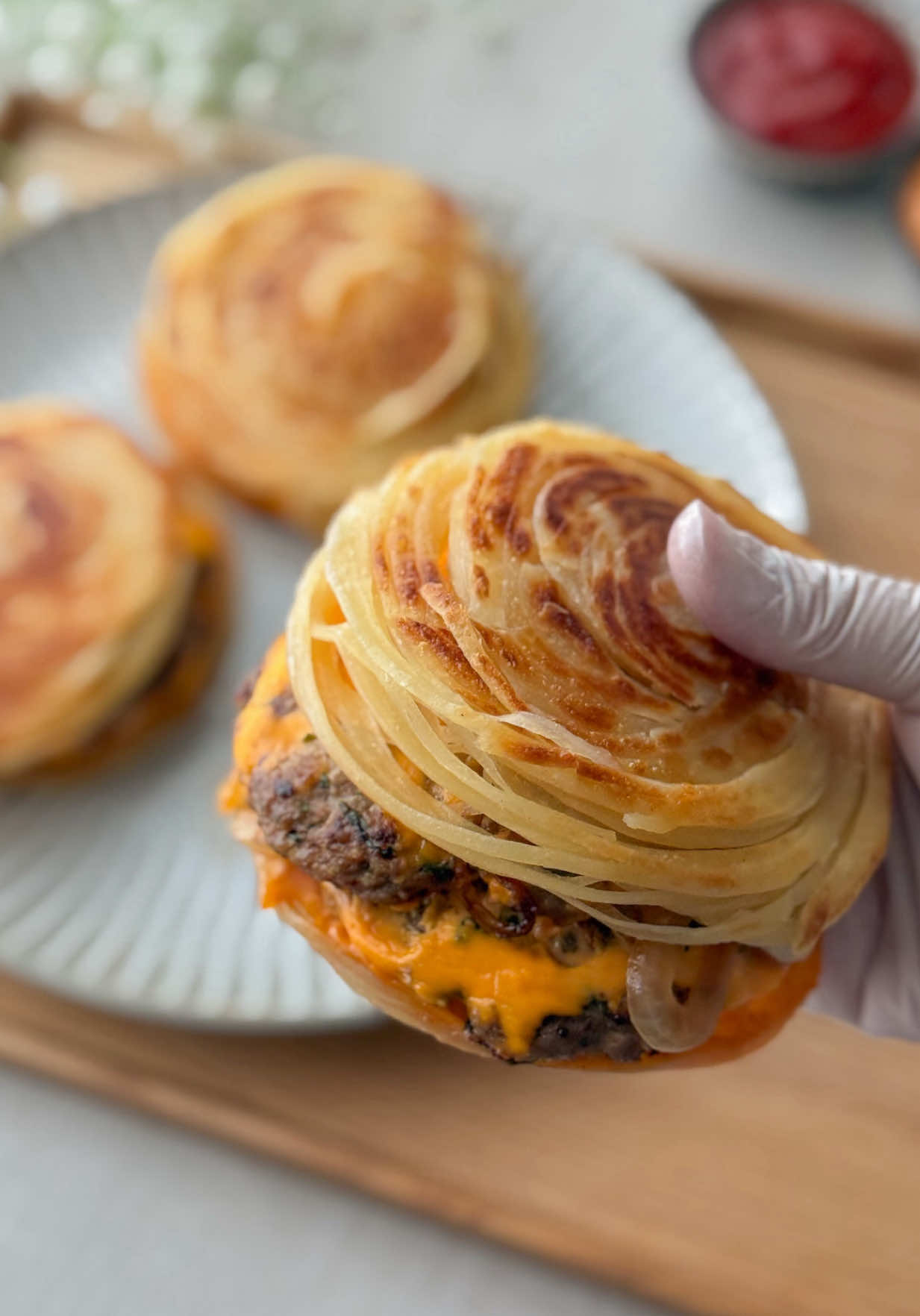 The famous Dubai Paratha Smash Burger is taking over social media and now you can make it at home!  Flaky,crispy paratha wrapped around juicy double beef smash patties,layered with melted cheese and a creamy special sauce the ultimate street food fusion you need to try. In this recipe I’ll show you step by step •How to smash the beef patties perfectly •How to make the creamy special burger sauce •How to use paratha as the burger bun •Tips for assembling & styling it just like the viral Dubai version Now you don’t need to travel to Dubai recreate this trending burger at home and impress your family & friends!  ✨Recipe coming soon on my YouTube Channel! 🌸Follow @mariumsfoodchannel  ➡️Link in bio for more recipes! _______________ #viraldubaiParathaSmashBurger #paratha #SmashBurger #Recipe #deliciousfoodrecipes