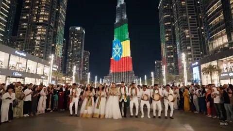They Turned Burj Khalifa Into an Ethiopian Wedding Party!” A surprise Ethiopian wedding flash mob lit up the Dubai night at Burj Khalifa! With the world’s tallest tower glowing in Ethiopian flag colors, dancers performed eskista shoulder isolations, stomps, and joyful wedding moves. The crowd clapped, filmed, and celebrated a fusion of culture, music, and love. This unforgettable performance shows how tradition and global icons can come together in the most vibrant way. #EthiopianWedding #BurjKhalifa #DubaiLife #FlashMob #CulturalCelebration 