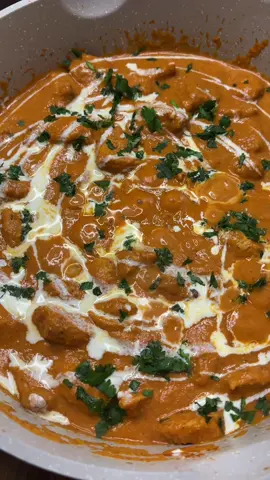 Butter Chicken with garlic naan is a weekly fave😮‍💨✨🥘  Here’s the full recipe👇🏽: For the chicken marinade: 500g chicken breast, cut into bite-sized chunks 2 heaped tbsp Greek yoghurt 1 tbsp lemon juice 2 tsp garam masala 1 tsp turmeric 1 tsp ground cumin 1 tsp paprika 1 tsp salt For the sauce: 2 tbsp unsalted butter  1 tbsp olive oil 1 large onion, finely chopped 1-2 bay leaves  3 tsp garlic puree 1 tsp ginger puree 1tbsp tomato puree  2 tsp garam masala 2 tsp ground coriander 1 tsp ground cumin 1 tsp paprika ½ tsp chilli powder 400g tin chopped tomatoes  30g cashews (optional)  1 tsp honey 120ml double cream  1 tsp salt (or to taste) Fresh coriander, chopped Method 	1.	Marinate chicken: Mix marinade ingredients, coat chicken, and refrigerate for at least 1 hour. 	2.	Cook chicken: Heat oil in a large pan, sear chicken until lightly charred 5-8 minutes (not fully cooked). Remove and set aside. 	3.	Make sauce: In the same pan, melt butter with oil. Add onion and cook until golden and caramelised. Add the bay leaves half way through 10-15 minutes, Stir in garlic and ginger puree for 1 minute. Add all spices and fry for 30 seconds. 	4.	Add tomatoes: Stir in tomato puree. Cook for 1-2 minutes before adding tomatoes, cashews, honey, and salt. Simmer 10 minutes. After 10 minutes blend the sauce to a smooth consistency.  	5.	Finish: Return chicken to the sauce, simmer 8–10 minutes. Stir in cream, cook 2–3 more minutes. Garnish with coriander. Easy Garlic Naan  4 tbsp Greek yoghurt 5 tbsp self-raising flour ½ tsp baking powder 1 tsp salt 1 tsp garlic puree Fresh coriander, chopped Melted butter for brushing Method: 	1.	Mix all ingredients into a soft dough, adding extra flour if sticky. Leave to rest for 10-15 minutes.  	2.	Divide into balls, roll into ovals. 	3.	Cook on a hot non-stick pan for 1–2 mins per side until puffed and golden. 	4.	Brush with a mix of melted butter, garlic puree, coriander. #EasyRecipe #butterchicken #DinnerIdeas #cookwithme #chickencurry 