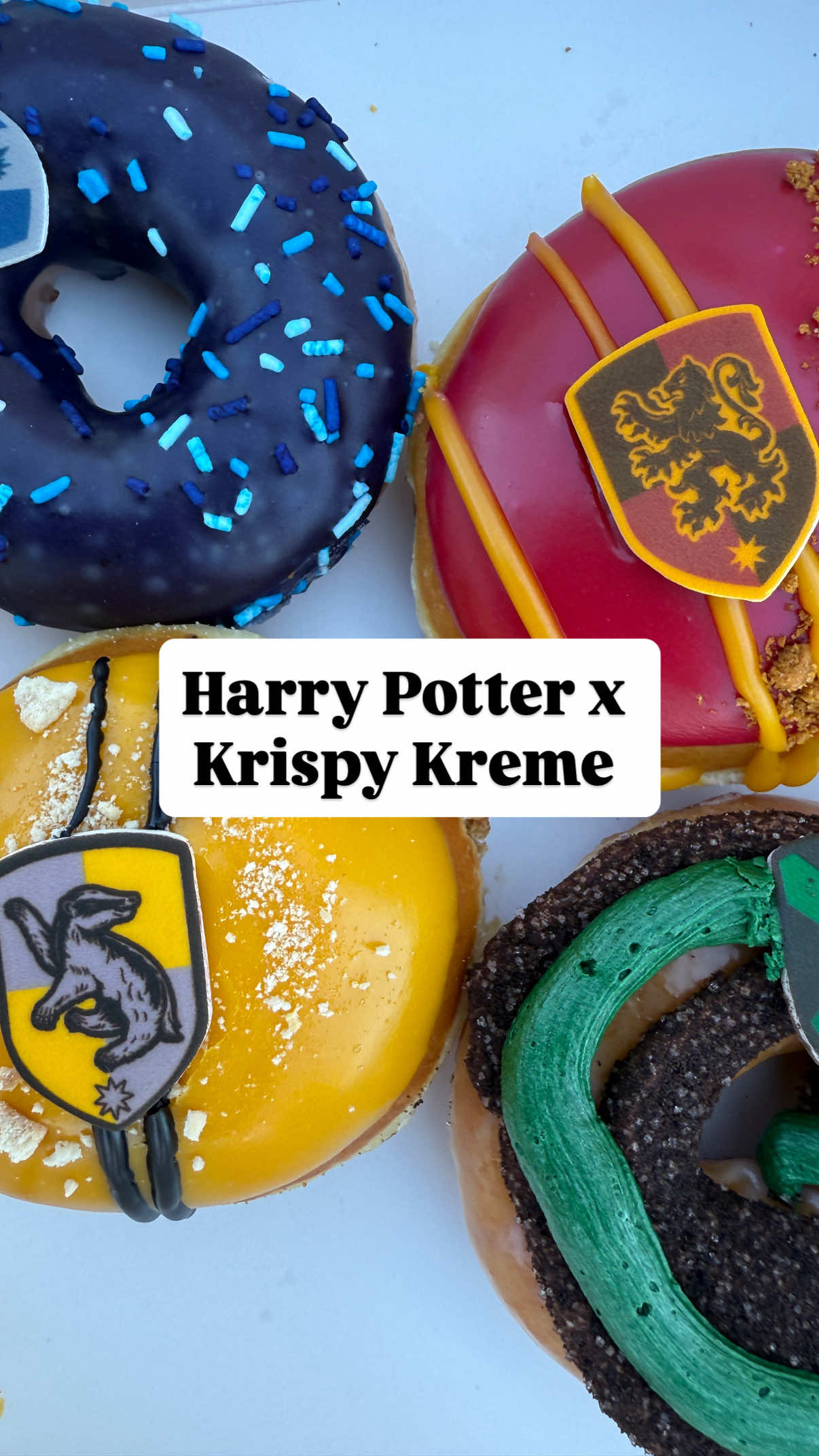 When I saw @Krispy Kreme was doing Harry Potter donuts … I RAN!!  Which house are you? ❤️💚💛💙 🦁🐍🦡🦅 ❤️GRYFFINDOR❤️ An unglazed shell filled with cookie butter Kreme, dipped in icing, and topped with Biscoff cookie crumble, golden drizzle, and the iconic Gryffindor crest. 💚SLYTHERIN💚 Original Glazed doughnut topped with rich chocolate, buttercreme swirls, and a chocolate cookie sugar sprinkle, topped with the iconic Slytherin crest. 💛HUFFLEPUFF💛  An unglazed shell doughnut filled with toffee flavored custard, dipped in golden icing and drizzled with chocolate. Topped with crunchy cookie crumbs and finished with the proud Hufflepuff crest.  💙RAVENCLAW💙  OG Glazed doughnut, dipped in blueberry icing and sprinkled with magic. Topped with the proud Ravenclaw crest.  #krispykreme #krispykremedonuts #harrypotter #harrypotterdonut #Foodie 