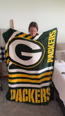 This is the best throw blanket!! Get yours now before it sells out, they are going quickly. Which team will you be rooting for this season? #nfl #football #fyp #packers #blanket 
