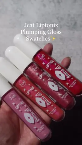 💋 Sparkle check! ✨ @glamsmitty is swatching 4 shades of our Liptonix Plumping Gloss and we’re obsessed with this glossy, glittery goodness 💖 Which shade has your heart? 💫 👇 Drop your fave in the comments! #JCatBeauty #LiptonixGloss #PlumpingGloss #GlossyLips #ViralMakeup #SparklyMakeup #TrendingBeauty #CrueltyFreeBeauty #MakeupReels #LipGlossSwatches