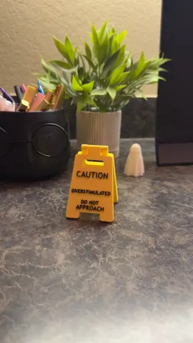 ⚠️When everyone is working them nerves left and right and your social battery on zero 0️⃣🤷🏿‍♀️  lol perfect for your desk at work or even your bar top 🤪🍻🪧  You need this cute  ⚠️CAUTION ⚠️   OVERSTIMULATED  DO NOT APPROACH Sign ‼️ Click the link above and snag you one or 5 lol 😝  #anxiety #overstimulated #sign #tiktokshop #fyp 