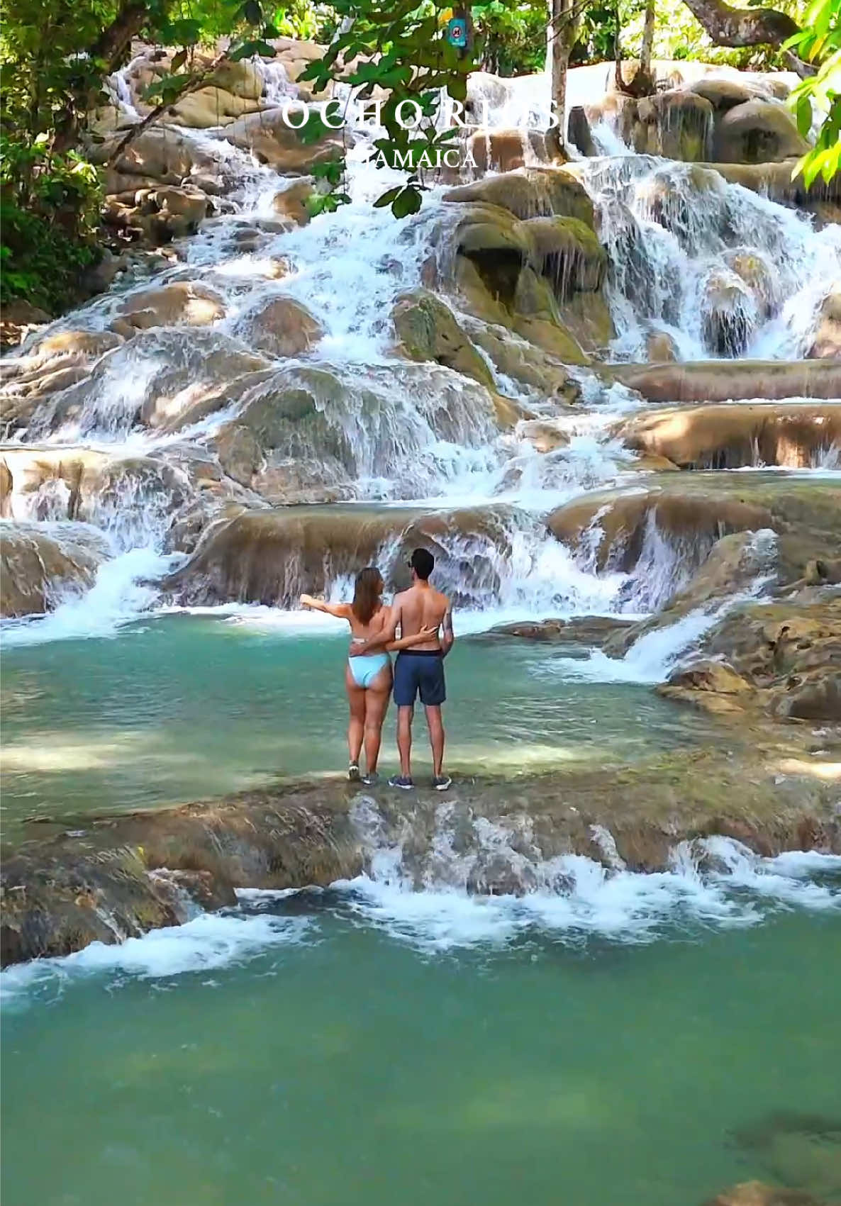 POV: you find paradise just a short, 2-hour flight from the U.S. where you can experience the perfect blend of luxury, adventure, and culture. Welcome to Ocho Rios, Jamaica. ✈️🇯🇲 We teamed up with @Visit Jamaica (#VisitJamaicaPartner) to showcase this island paradise and experience easy-to-book itineraries through Breeze, an online tool that does the trip planning for you. Some of our favorite destination experiences include: ✔️Rafting the Martha Brae River ✔️ Romantic dinner on the beach ✔️ Morning swim at Dunns River Falls ✔️ Cliff Jumping at Blue Hole ✔️ Exploring the Green Grotto Caves From beautiful beaches, endless adventure, and the vibrant Jamaican culture, it’s no surprise we’ve completely fallen in love with this tropical destination. 🏝️🌎 🎥 @thecapturingcouple #visitjamaica #jamaica #caribbeantravel #bucketlisttravel    