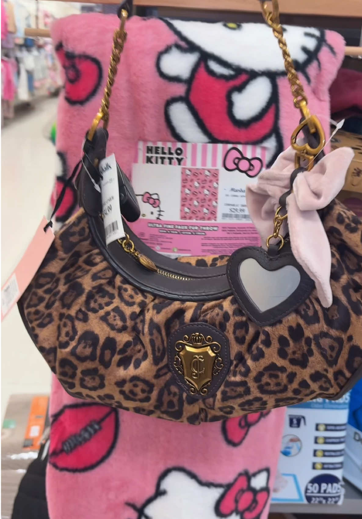 I can't believe I found this Beauty !! I was on hold with TJ Maxx, looking for the bag when I walked into the store @Marshalls and the two girls were putting it out on the shelf as I was walking over I was in disbelief! So if you're looking people, it is also at Marshalls now obviously the only bag they put out today and it was this bag.💕 #juicycouture #juicycouturefinds #hellokitty  #marshalls #leopardprint 
