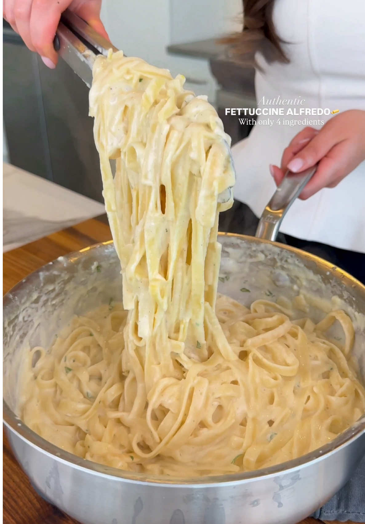 Authentic Fettuccine Alfredo with 4 ingredients🧈 Buttery, cheesy and silky smooth. A simple recipe that proves less really is more🍝 Ingredients:  • 1 cup of heavy cream  • 2 cups freshly grated parmigiano reggiano (very finely grated) @Whole Foods Market  • 4 tbsp unsalted butter @Vital Farms  • 2 garlic cloves, minced  • 1/2-1 cup pasta water • Salt and pepper to taste  Instructions:  1. Bring a large pot of salted water to a boil, cook the fettuccine until al dente. Reserve 1 cup of pasta water, then drain.  2. In a large pan, melt the butter over low heat. Add the minced garlic and sauté for 30 seconds until fragrant.  3. Add the heavy cream and gently simmer for 2 minutes. Add salt and pepper as needed (don’t do to much salt as the parmigiano reggiano is salted)  4. Add the hot pasta directly into the sauce. 5. Add the grated parmigiano reggiano, and slowly start splashing the reserved pasta water until you get a glossy, creamy sauce.  6. Serve immediately, to with extra parmigiano and freshly cracked black pepper and enjoy!  #authenticalfredopasta #alfredopasta #pastasauces #pastarecipes 
