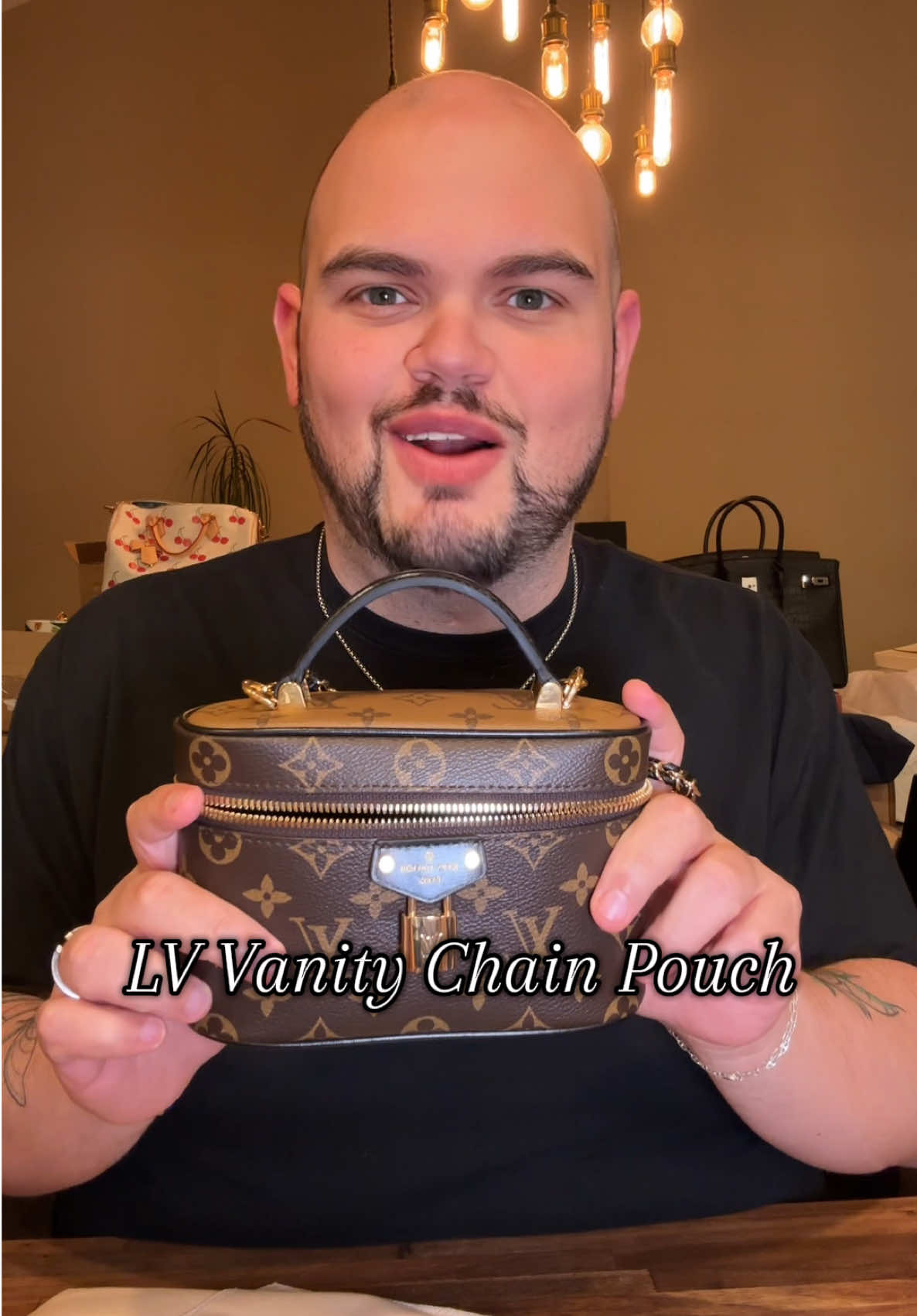 The perfect little statement piece. ✨ The LV Vanity Chain Pouch is everything. It may be mini, but it's got major style.  #Unboxing #newbag #ChainPouch #LuxuryBag #DesignerBag 