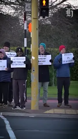 Nearly 20,000 secondary school teachers are going on strike today. The action is in response to what the Post Primary Teachers’ Association (PPTA) describes as an “appalling” pay offer from the Government. Groups of protesting teachers this morning stood outside Auckland high schools holding placards, chanting and waving to garner support from rush-hour commuters. Around 100 teachers were outside Kelston Girls’ College to support the protest action. Striking staff held up large banners that read “the numbers do not add up” and “value teachers”. Teachers on the picket line said they would prefer to be inside classrooms today but it was necessary to take this action to be able to teach their pupils. Associate Education Minister David Seymour told Herald Now’s Ryan Bridge that more negotiation from teachers may have been more “responsible”. “I just think to go to a strike after a few days of negotiating may be a little bit trigger-happy.” He said the decision to strike so close to exams was likely made by union leadership, conceding that teachers had likely been put in “a difficult position”. The Government has offered a 1% pay rise every year for three years in collective agreement negotiations. Seymour defended the government’s offer, noting that teachers’ pay had already increased by 14% in the last few years, and stating that 60% of teachers earn more than $100,000. PPTA president Chris Abercrombie said the offer was the lowest increase in a generation and between 18,000 and 19,000 teachers would be protesting today. He said the Government’s offer was “appalling” and argued it failed to help efforts to recruit and retain teachers within the workforce. “We’re really disappointed that we have to strike, it’s not what we want, we want to be in the classroom teaching,” Abercrombie said. “But what we’re striking for is basically to get the Government to move the needle on these offers.” 📹 NZ Herald