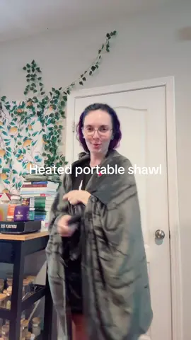 This electric blanket is wearable, has a battery pack and is machine washable!! 